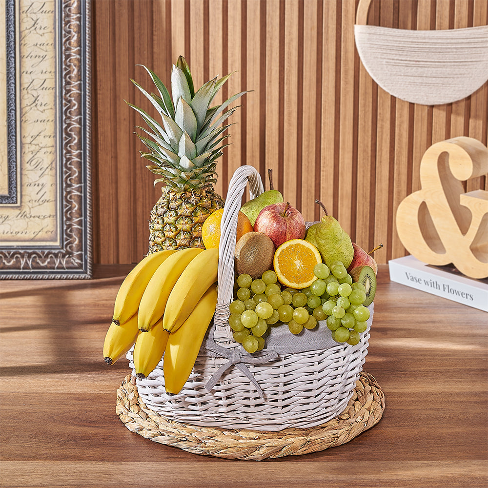 White Wicker Basket Filled with Fresh Tropical Fruits – how the gift is presented