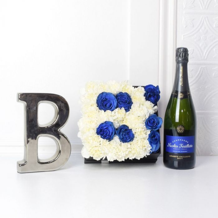 Celebrate Baby Boy Gift Box with Champagne and Blue-White Roses – how the gift is presented