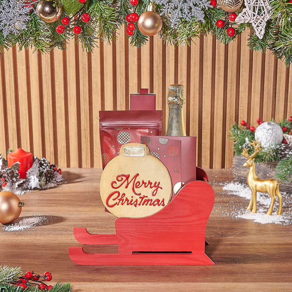 Sparkling Wine and Hollyberry Gourmet Treats Gift in Classic Red Sled Basket – how the gift is presented