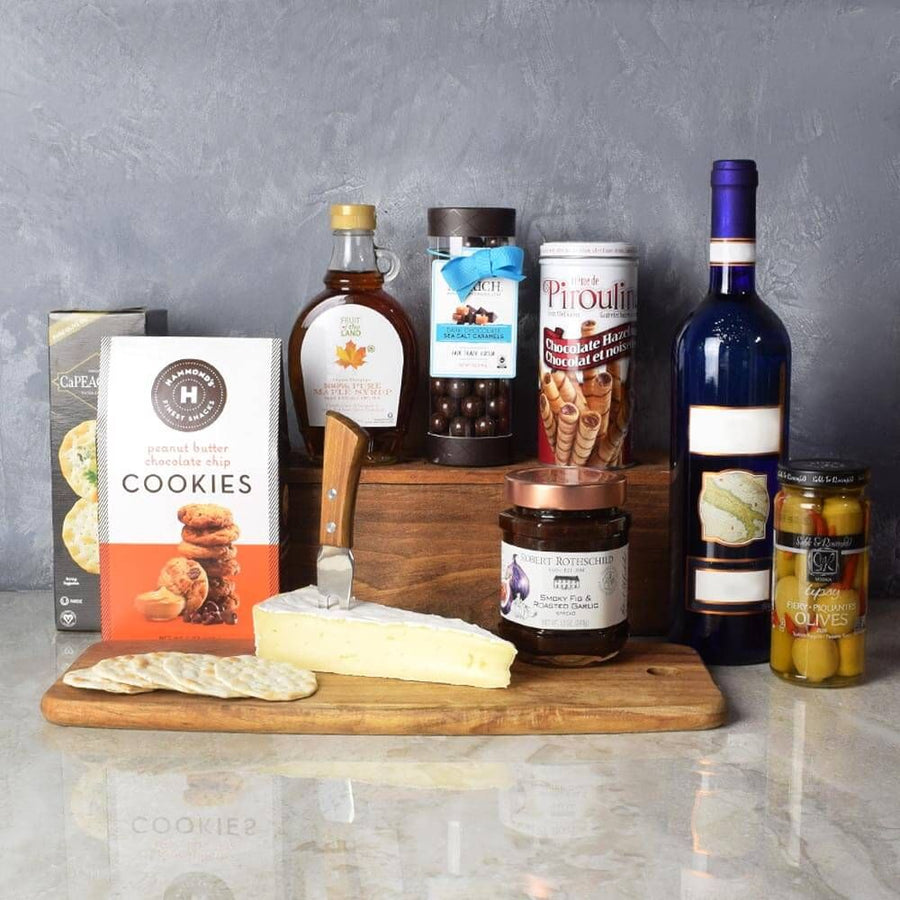 "Deluxe Kosher Wine Basket" Gourmet Cheese and Crackers, Chocolate, and Cookies in a Cutting Board with a Bottle of Wine from Ottawa Baskets - Ottawa Delivery