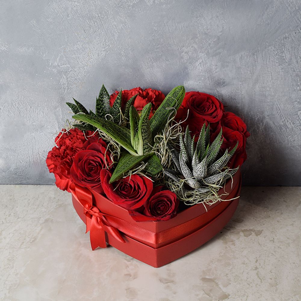 Heart-Shaped Box Floral Arrangement with Red Roses and Carnations – how the gift is presented